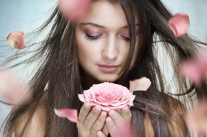 Woman with pink flower